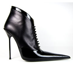 Ultra-high laced ankle boot with extreme winklepicker pointed toe. Black leather and patent upper. Leather sole, full gold leather lining. Made in Italy exclusively for RoSa Shoes